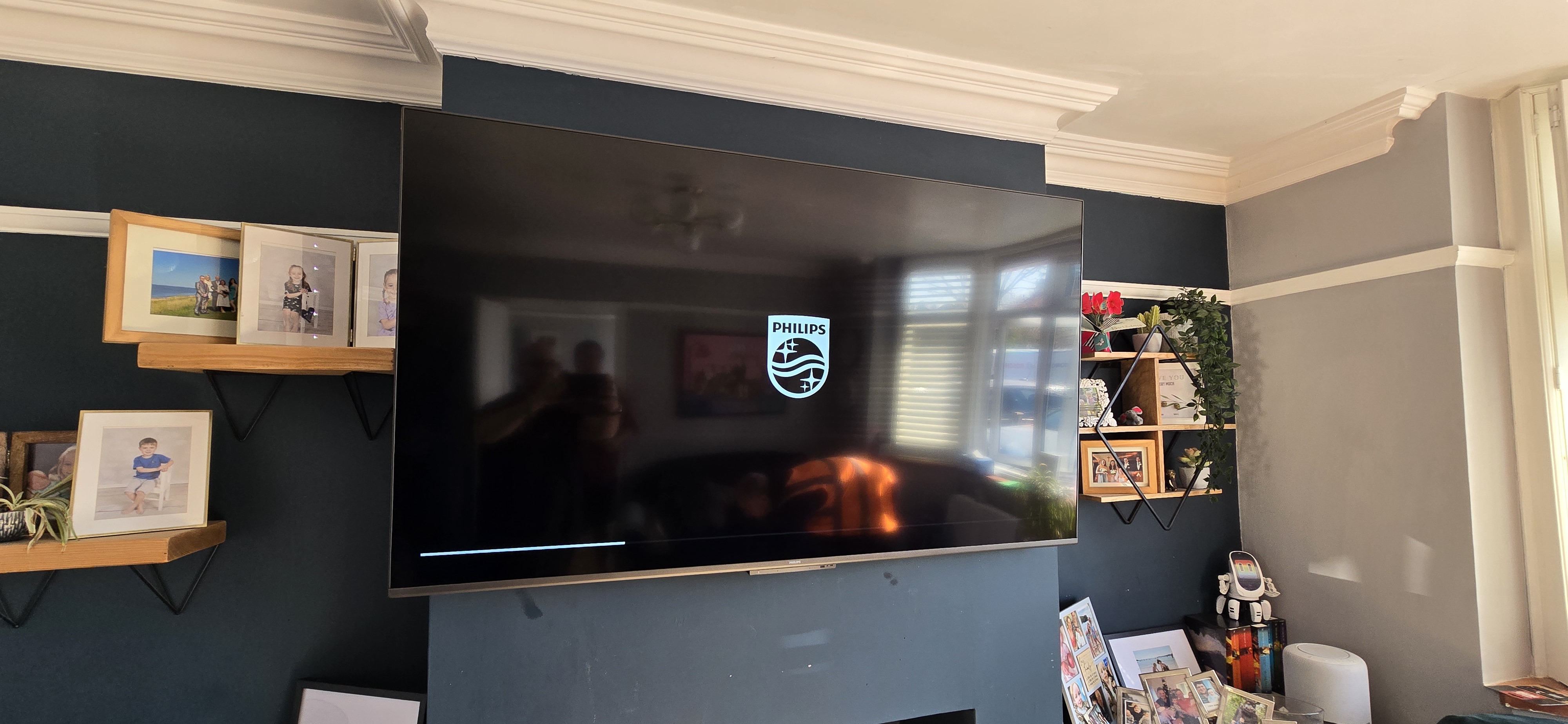 TV wall-mounted, cables tidied away